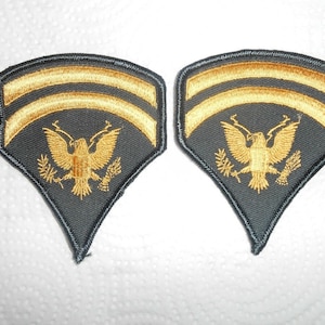 US Army Specialist 6 SP-6 Rank Insignia Pair USGI Unissued