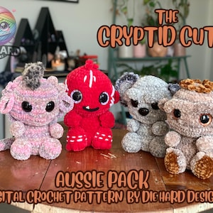 May include: A digital crochet pattern for making four amigurumi plushies, called "The Cryptid Cuties Aussie Pack". The plushies are a pink and grey creature, a red creature, a grey creature, and a brown creature.