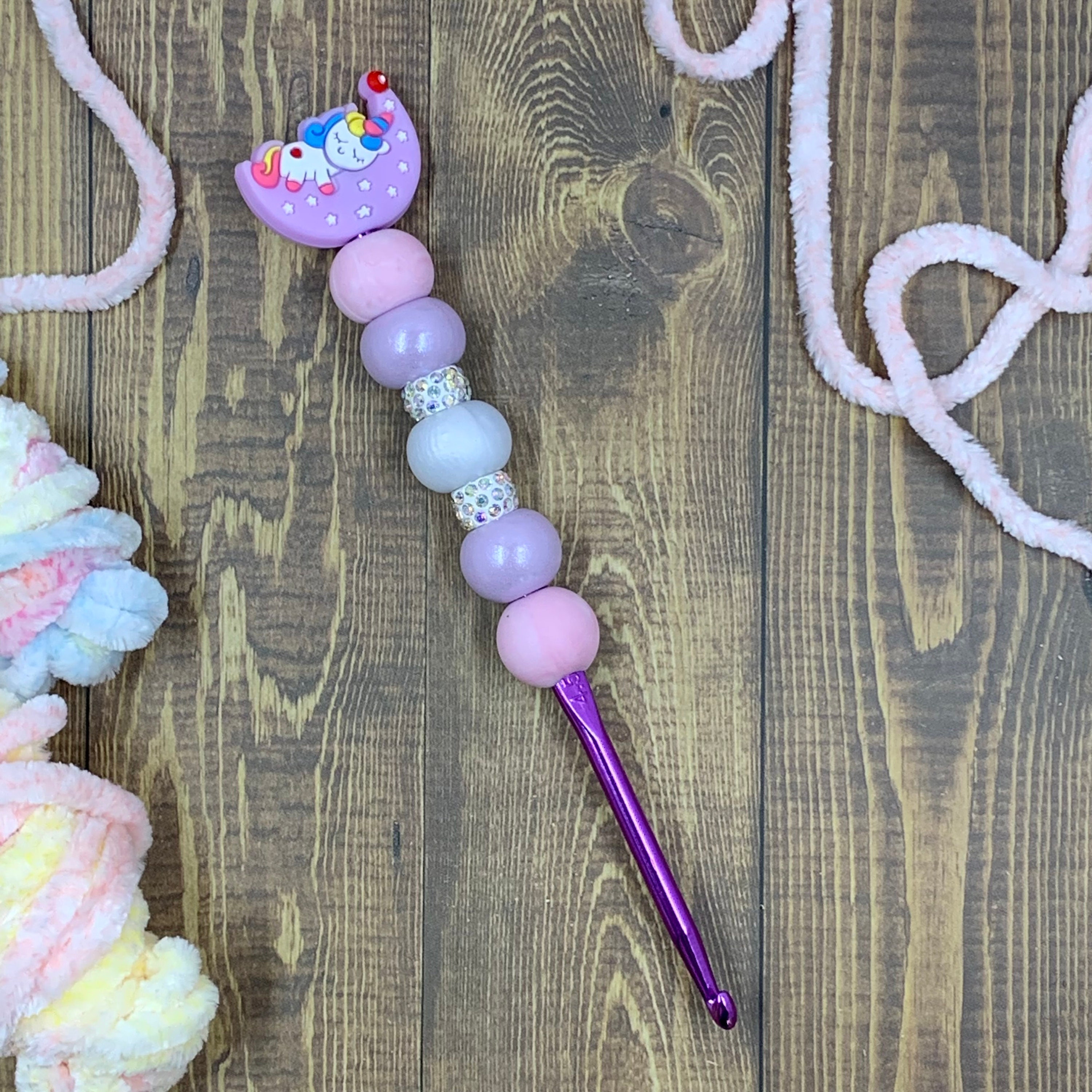 Beaded Ergonomic Crochet Hook With Silicone Beads and a Silicone Focal Bead.  This is an 8mm Size or an L Crochet Hook. 