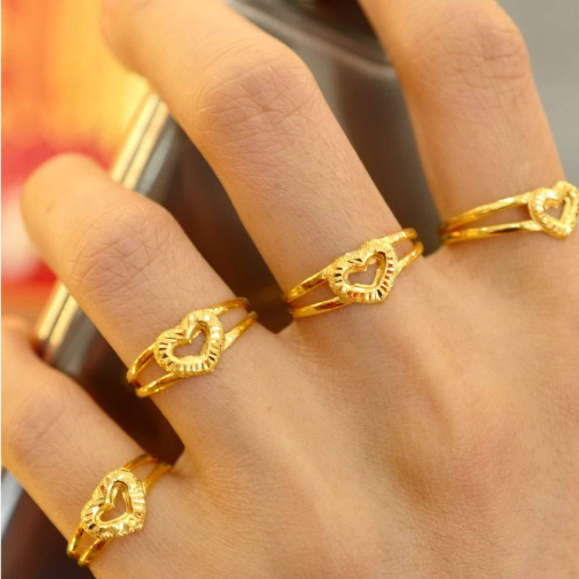 A Pair of Rosaria Varra 24 Karat Gold Handmade Band Rings - ROSARIA VARRA  FINE JEWELRY