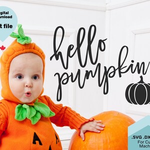 May include: A baby wearing an orange pumpkin costume with green leaves, touching a large orange pumpkin. The text "hello pumpkin" is written in black cursive script above the pumpkin. The text ".SVG .DXF .PNG For Cutting Machines" is written in black at the bottom of the image.