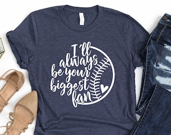 May include: A navy blue t-shirt with a white baseball graphic and the text "I'll always be your biggest fan".