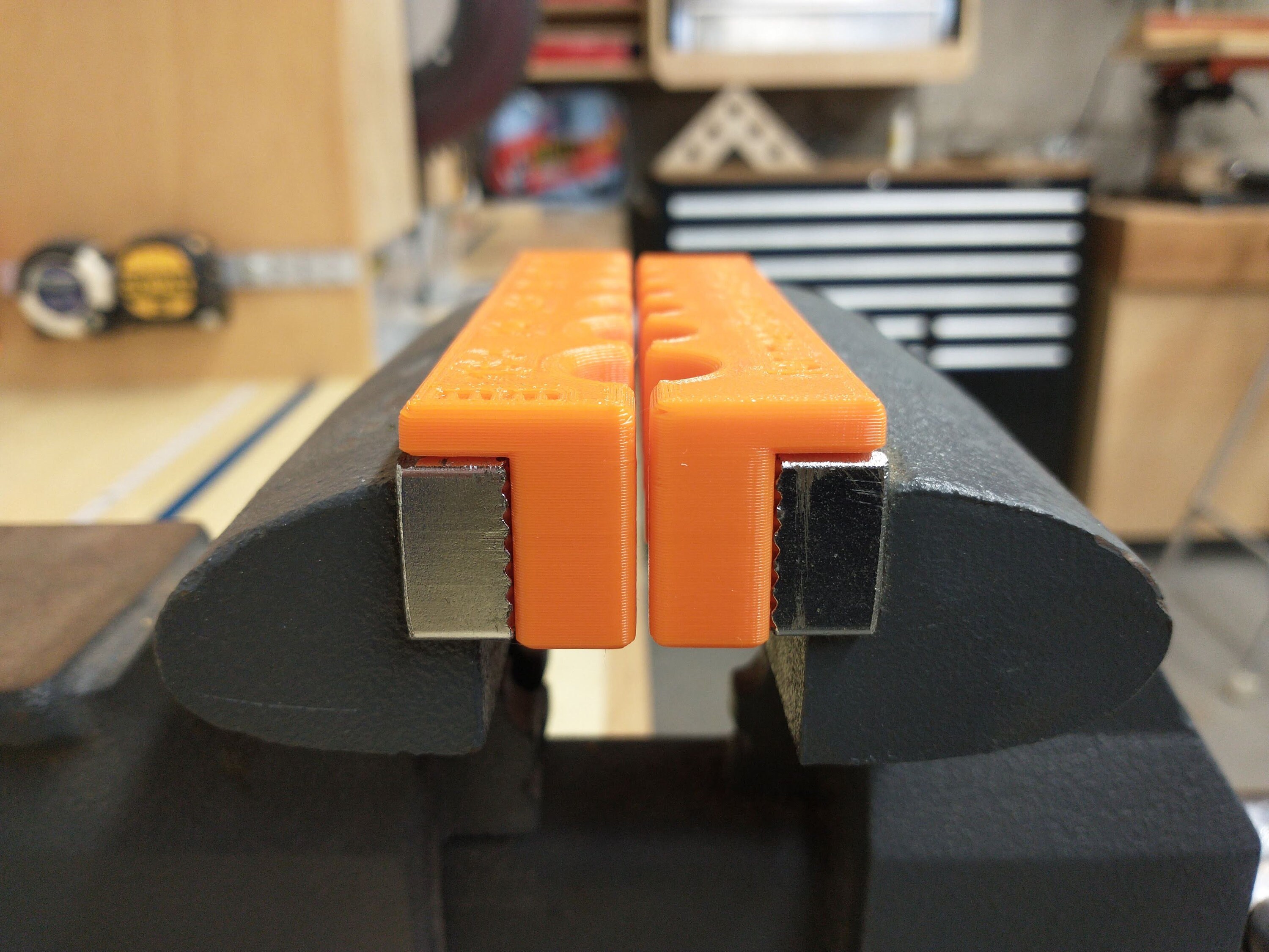 thumbnail image 2 of Orange Manitou Clamp Block With Magnets – Universal Fit For Most Forks & Shocks 2 of 5