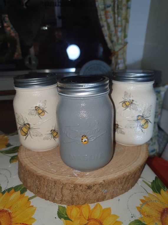 grey and yellow tea coffee sugar canisters