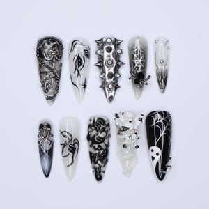 Black and Silver 3D Press-On Nails with Spikes, Chains, and Gothic Designs, Long Stiletto Nails for Halloween or Goth Fashion