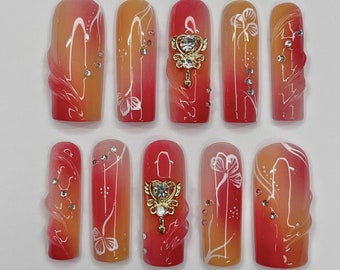 Freestyle rosso e arancione lungo quadrato stampa sulle unghie, unghie finte con aerografo, unghie cromate taglienti, unghie per feste di compleanno