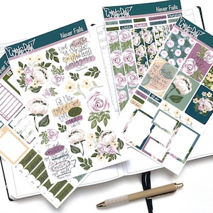May include: A set of floral themed planner stickers with the words "Never Fails" and bible verses. The stickers feature a variety of floral designs, including roses, leaves, and flowers. The stickers are perfect for adding a touch of elegance and inspiration to your planner.