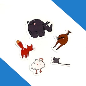 May include: Five colorful animal stickers with their backsides facing the viewer. The animals are a rhino, a horse, a fox, a chicken, and a mouse.