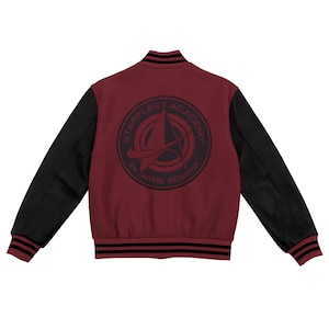 May include: Maroon and black Starfleet Academy varsity jacket. The jacket has black sleeves and a maroon body with a Starfleet Academy emblem on the back. The emblem includes the Starfleet insignia and the words "Starfleet Academy" and "Ex Artis Scientia".