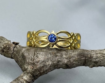 750 yellow gold band ring - Celtic love knot - with Ceylon sapphire - 18 carat