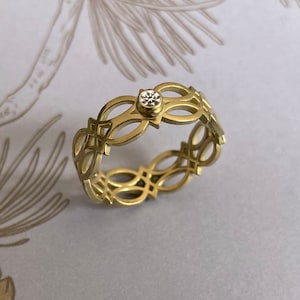 750 yellow gold band ring Celtic love knot with brilliant 18 carat image 1