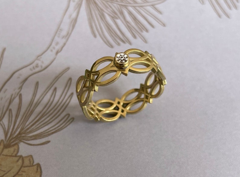 750 yellow gold band ring Celtic love knot with brilliant 18 carat image 1