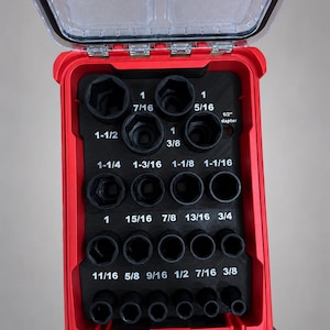 May include: A black socket organizer insert inside a red case with a clear lid. The insert features labeled slots for various socket sizes ranging from 3/8 inch to 1-1/2 inches, including a 1/2 inch adapter slot. Text reads: INSERT ONLY - NO TOOLS - NO BATTERY - NO BOX.