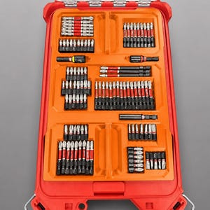 May include: A red plastic tool organiser insert with multiple compartments containing various metal drill and driver bits with red and black shafts. The text at the bottom reads: INSERT ONLY - NO TOOLS - NO BATTERY - NO BOX.