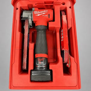 May include: A red plastic molded insert for a Milwaukee M12 Fuel belt sander, featuring custom-shaped compartments for the tool and two sanding belts. The text 'INSERT ONLY - NO TOOLS - NO BATTERY - NO BOX' is printed at the bottom of the image.