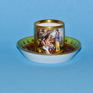 A 19th Century Meissen Green and Gilded Cup and Saucer