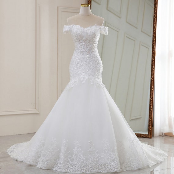 Inexpensive custom bridal gowns by Darius
