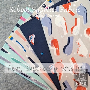 May include: A selection of school supplies fabric, 100% cotton, with prints of pens, trainers, and whistles. The fabric features a range of colours including blue, grey, and red. The text "School Supplies Fabric" and "Pens, Sneakers & Whistles" are visible.