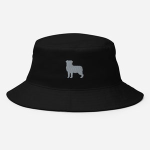 May include: Black bucket hat with a gray embroidered silhouette of an Australian Shepherd.
