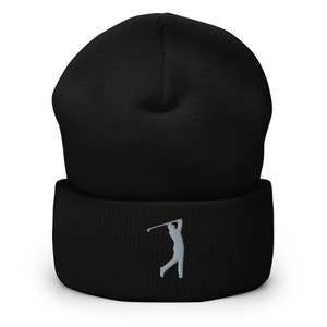 May include: Black beanie with a gray embroidered golfer silhouette.