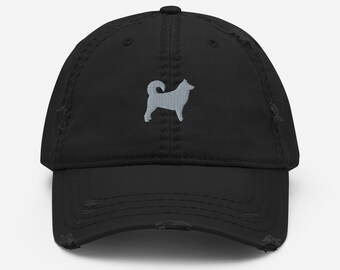 May include: A black distressed baseball cap with a gray embroidered silhouette of a dog.