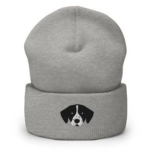 May include: Gray beanie with a black and white dog face embroidered on the front.