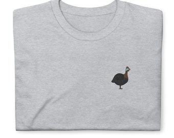 May include: A heather grey t-shirt with a small, embroidered image of a guinea fowl.