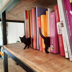 Cat silhouettes to place between books