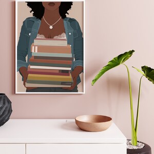 May include: A digital illustration of a person with brown skin holding a stack of books. The person is wearing a denim jacket and a white lace top. The background is a light pink color.