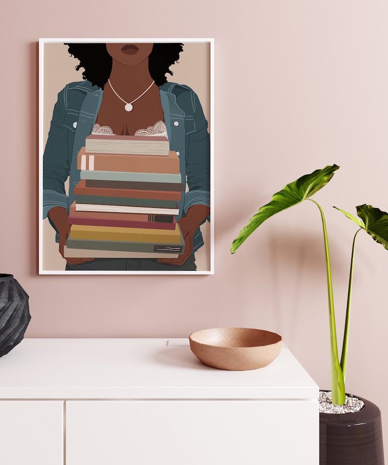 May include: A digital illustration of a person with brown skin holding a stack of books. The person is wearing a denim jacket and a white lace top. The background is a light pink color.