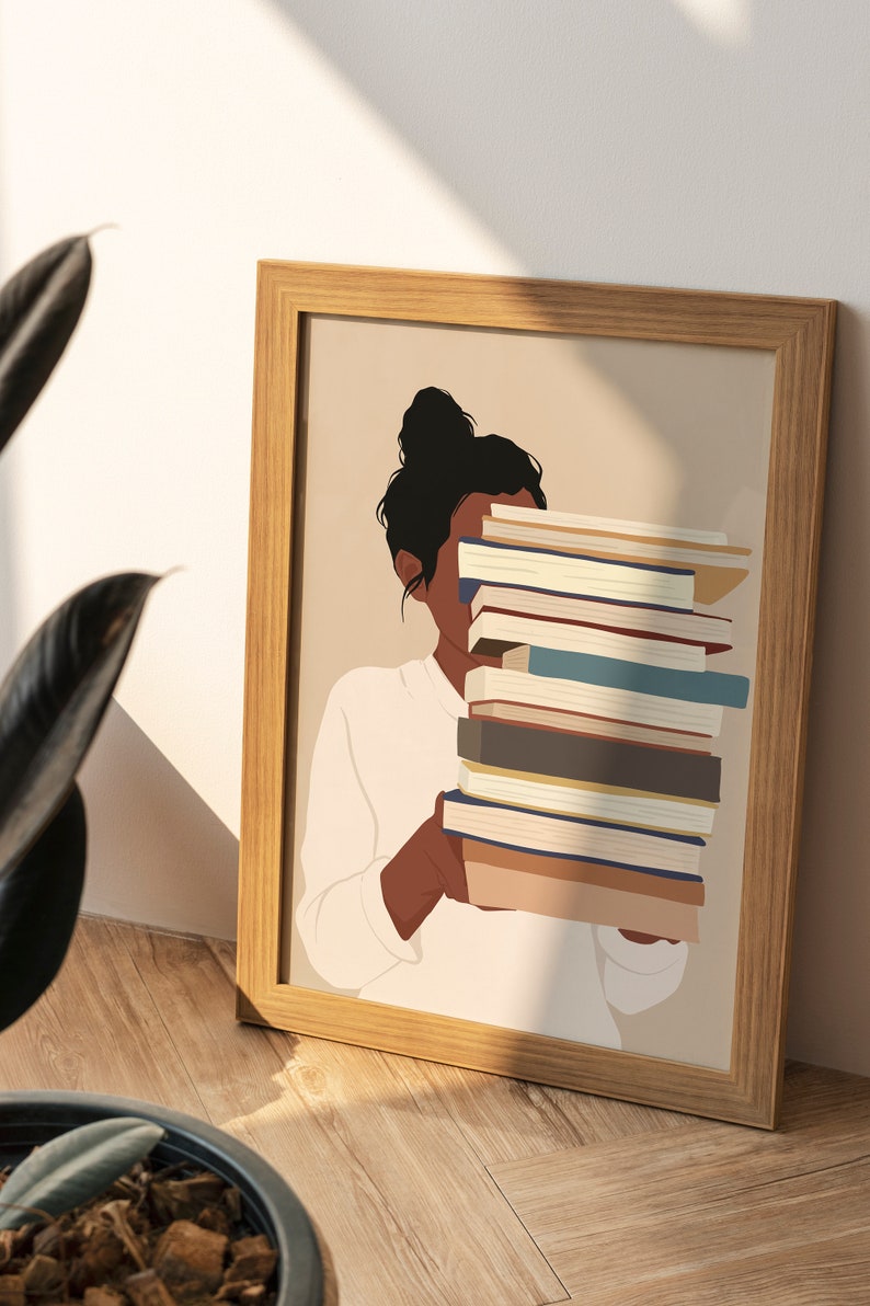 Peut inclure: Illustration encadr&eacute;e d'une personne tenant une pile de livres. Le visage est partiellement cach&eacute;. Les livres ont des dos de couleurs vari&eacute;es, et le cadre est en bois clair. Th&egrave;me litt&eacute;raire.