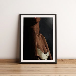 May include: A framed painting of a person's torso, with a focus on the neck and shoulders. The person has dark skin and is wearing a white top. The background is dark.