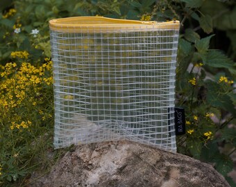 Genomskinlig sminkväska: Minimalistisk PVC-sminkväska med gul dragkedja (21 cm)