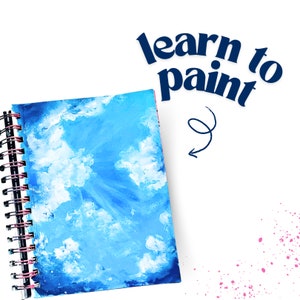 May include: A blue spiral bound sketchbook with a painted sky scene of white clouds on a blue background. The text "learn to paint" is written in blue above the sketchbook.