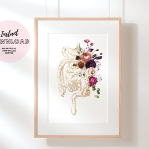 May include: A printable art print featuring a gold outline of the human digestive system with a bouquet of watercolor flowers in shades of pink, purple, and red.