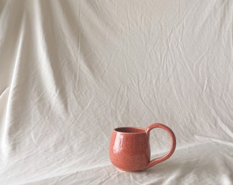 Handmade ceramic mug / medium pink speckled glaze