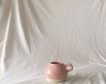 Handmade ceramic mug / light pink speckled glaze