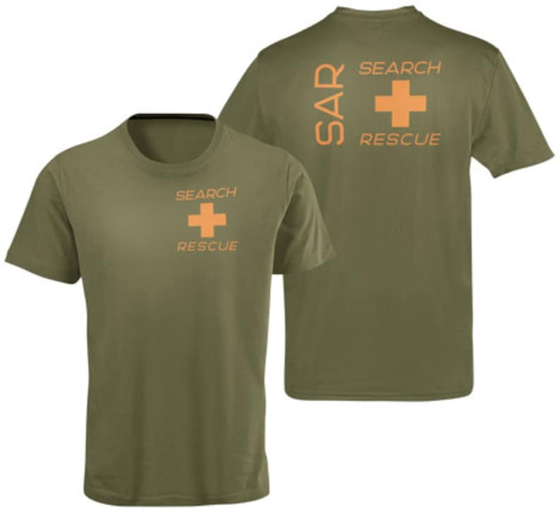 May include: A green t-shirt with the words "SEARCH RESCUE" and a red cross on the front. The back of the shirt has the words "SAR SEARCH RESCUE" and a red cross.