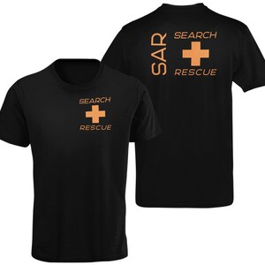 May include: Black t-shirt with the text "SEARCH RESCUE" and a white plus sign on the front. The back of the shirt has the text "SAR SEARCH RESCUE" and a white plus sign.
