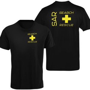 May include: Black t-shirt with a yellow "SAR SEARCH RESCUE" logo on the back and a yellow "SEARCH RESCUE" logo on the front.