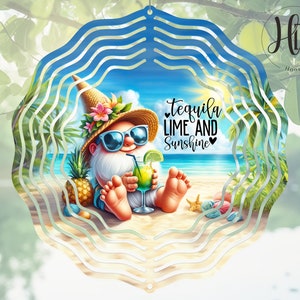 May include: A metal wind spinner with a beach scene featuring a gnome wearing sunglasses and a straw hat, holding a margarita. The text "Tequila Lime and Sunshine" is written on the spinner.