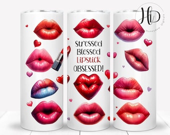 May include: A white tumbler featuring various watercolor lip designs in shades of red, pink, and purple, along with red and purple hearts. The text "Stressed Blessed Lipstick Obsessed!" is displayed in black and red.