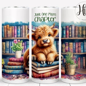 May include: A white tumbler with a design of a Highland cow sitting on a stack of books in front of a bookshelf. The text "Just one more chapter" is printed on the tumbler.