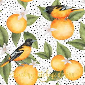 May include: A seamless pattern featuring orange blossoms, oranges, and Baltimore orioles on a white background with black polka dots.