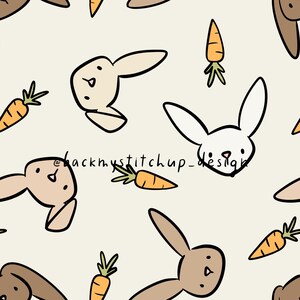以下が含まれることがあります： 薄いベージュの背景に、茶色と白のウサギとニンジンが描かれたシームレスなパターンです。