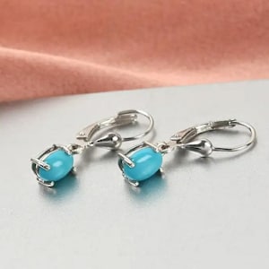 Sleeping Beauty Turquoise Earrings: Sterling Silver Lever Back, Oval Cut