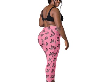 Vibrant pink leggings with black and gray butterflies