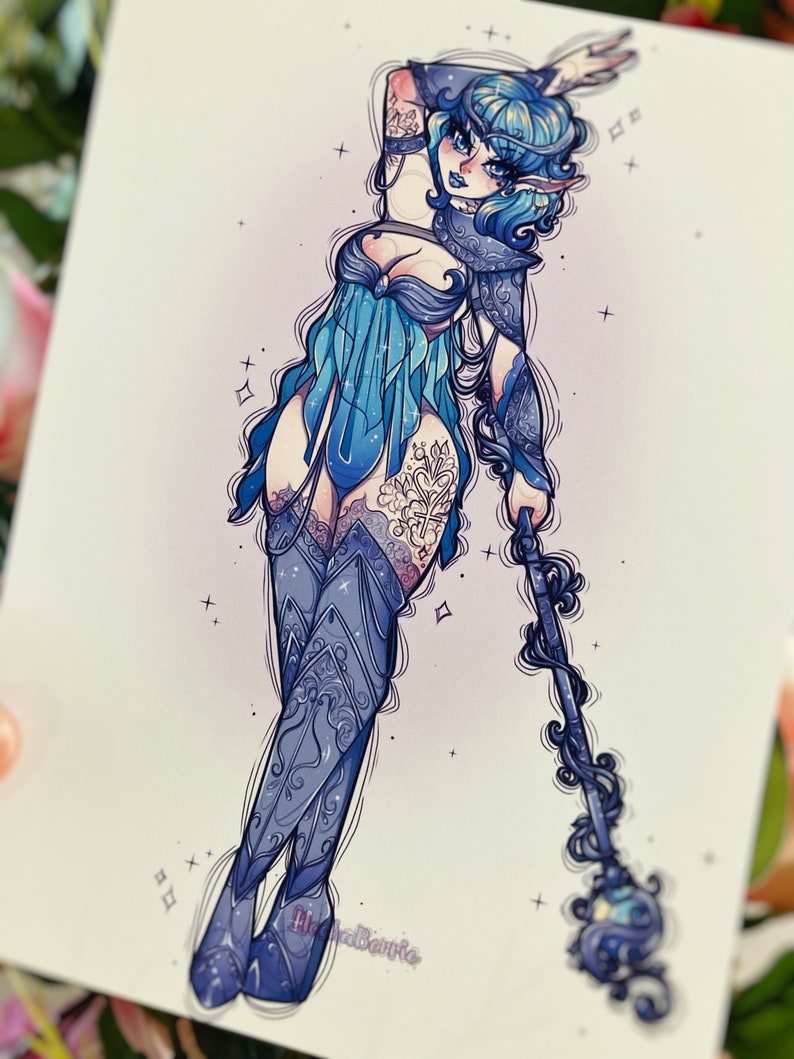May include: A digital illustration of a character with blue hair and pointed ears, wearing blue armor and a flowing tunic. The character holds a long, dark blue staff with a glowing orb at the tip. The artwork features intricate line work and stars.