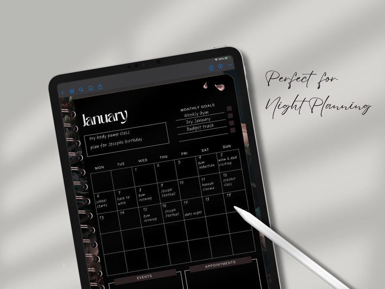 May include: A digital planner on a black tablet displays a January calendar with a spiral binding. The screen shows a monthly view with daily entries and a section for monthly goals. A white stylus points to the calendar. Text on the screen includes "try body pump class" and "plan for Joseph's birthday."
