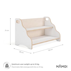 May include: A white and light wood two-tier shelf with side handles, measuring 31 cm in height, 50 cm in width, and 28 cm in depth. The unit features a maximum user weight capacity of 10 kg and includes the brand name MAMOI printed on the bottom right.